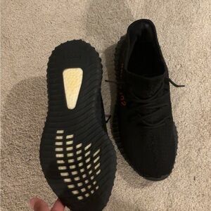 Yeezy Red Black size 9.